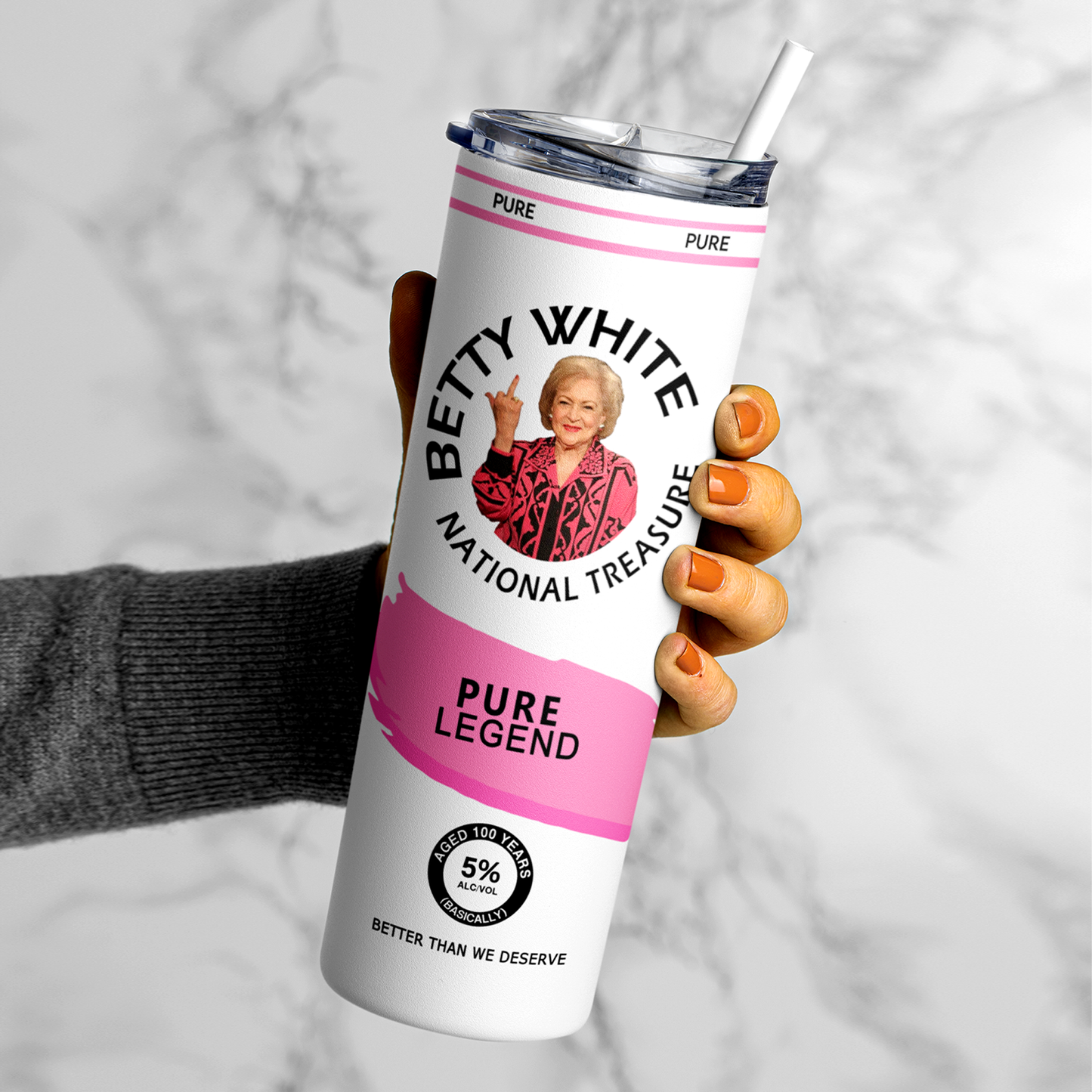 A 20oz stainless steel tumbler featuring an image of Betty White flipping the bird, designed in a hard seltzer theme. The tumbler includes a secure lid and straw, with a vibrant, long-lasting print. Perfect for fans of Betty White, sassy humor, and unique drinkware. Keeps beverages hot or cold for hours.