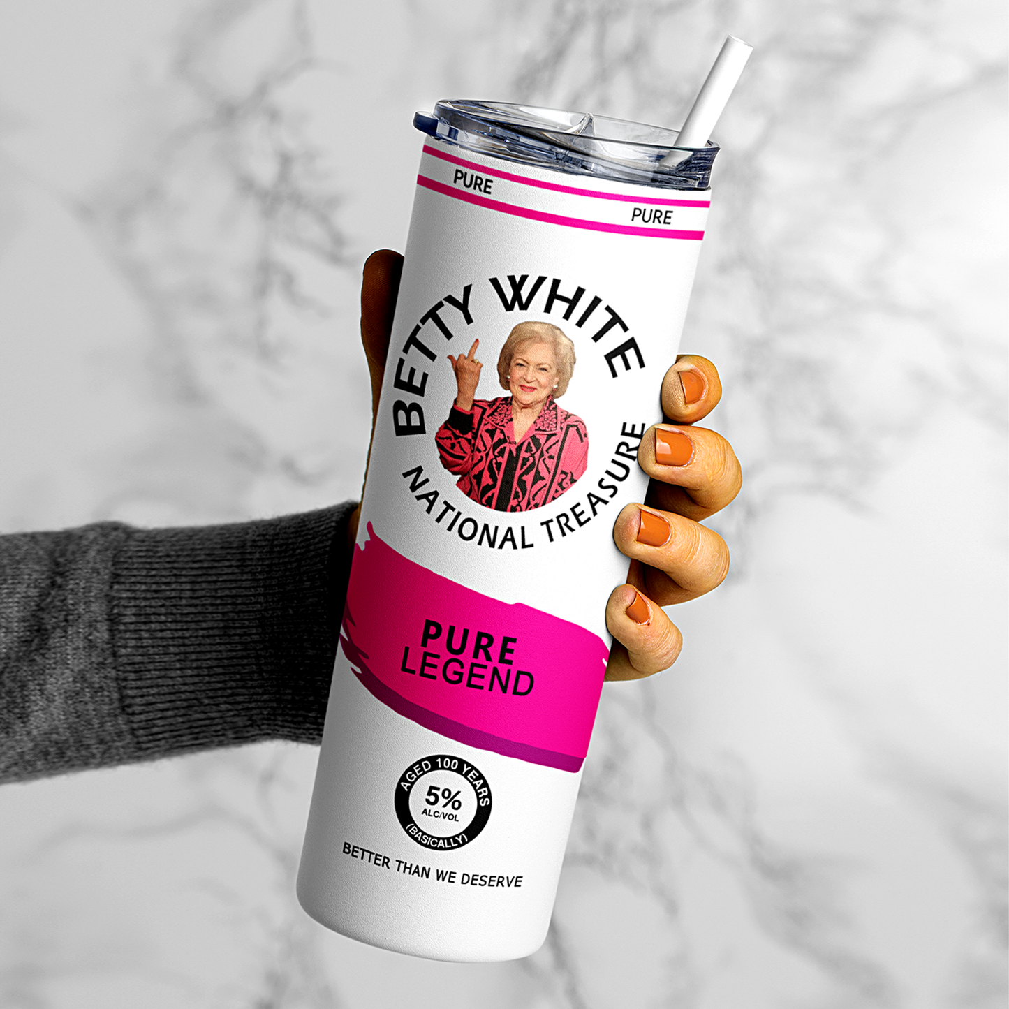 A 20oz stainless steel tumbler featuring an image of Betty White flipping the bird, designed in a hard seltzer theme. The tumbler includes a secure lid and straw, with a vibrant, long-lasting print. Perfect for fans of Betty White, sassy humor, and unique drinkware. Keeps beverages hot or cold for hours.