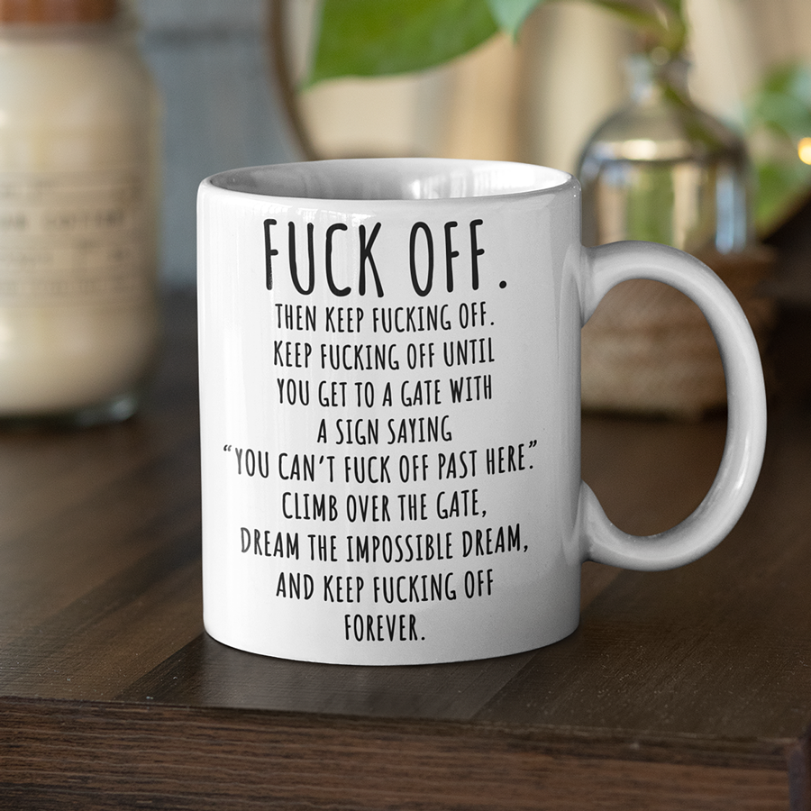 White ceramic coffee mug with bold black text that says 'Fuck Off' — a humorous and edgy gift for those who love sarcasm and strong coffee. | by Switzer Kreations