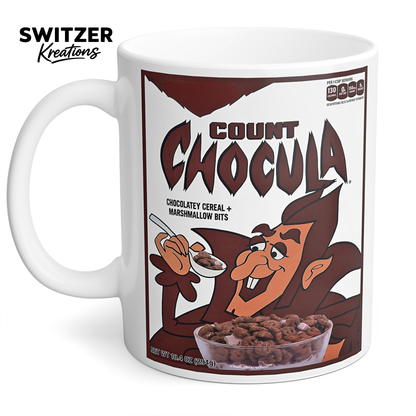 White ceramic coffee mug featuring a vintage Count Chocula-inspired cereal design, available in 11 oz and 15 oz sizes.