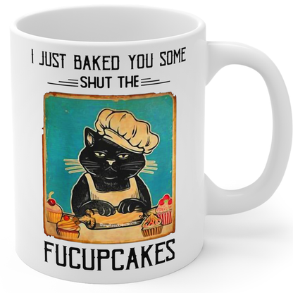 Fucupcakes Coffee Mug 11 Oz with a black cat illustration and humorous text on a white background