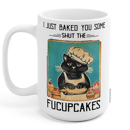 Fucupcakes Coffee Mug with a black cat illustration and humorous text on a white background
