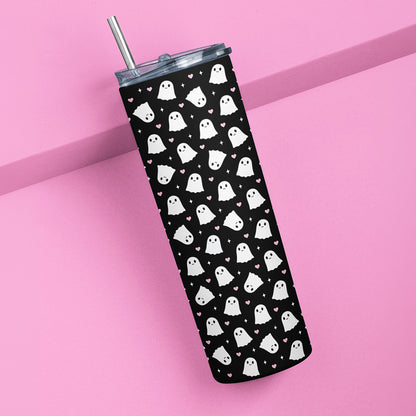 Cute black 20 oz ghost tumbler with pink hearts and stainless steel straw on a pink background