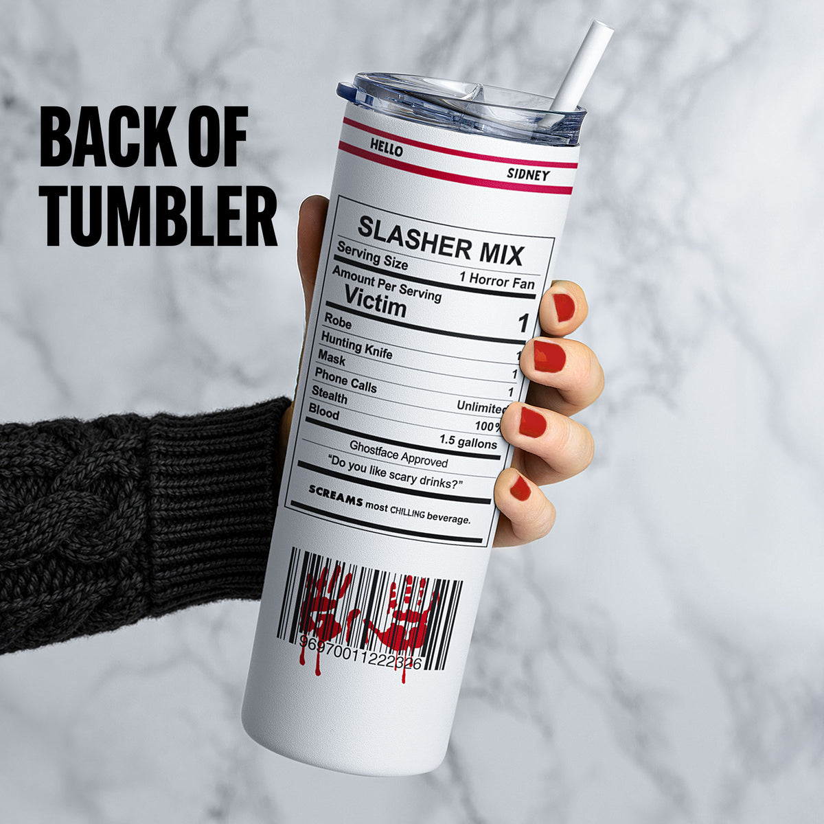 Back view of 20 oz horror slasher skinny tumbler with parody nutrition label, barcode design, sliding lid and straw