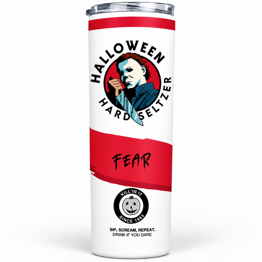 A white insulated tumbler with a clear lid, featuring a Halloween-themed Michael Myers graphic and the words 'HALLOWEEN HARD SELTZER' and 'FEAR' on a clean white background.