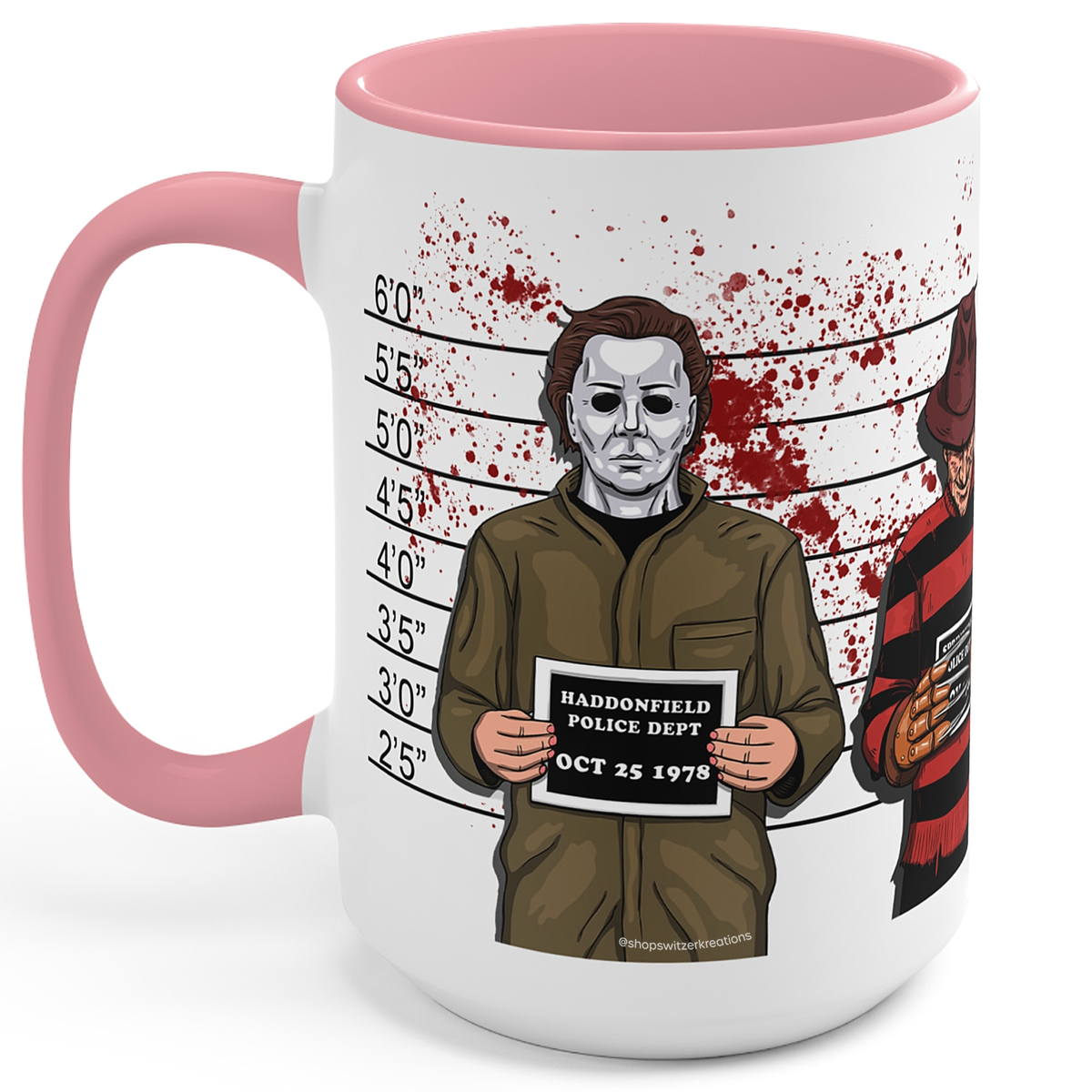A white ceramic mug with a pink handle and interior, featuring a graphic print of Michael Myers in a Haddonfield police department mugshot lineup photo with blood splatters and a second figure at the side.