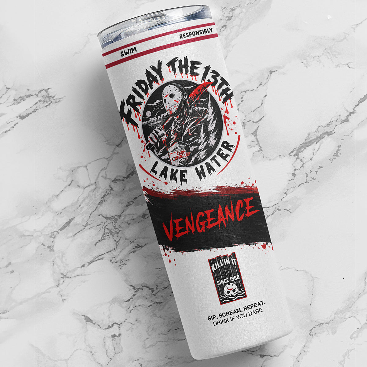 A white insulated tumbler with a clear lid, featuring a horror-themed graphic that reads 'Friday the 13th Lake Water' and 'Vengeance' in red and black, placed on a white marble surface.